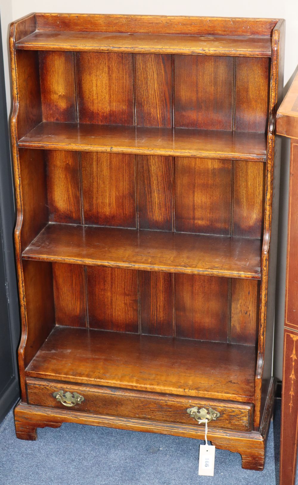 An oak waterfall open bookcase, W.60cm, D.26cm, H.101cm